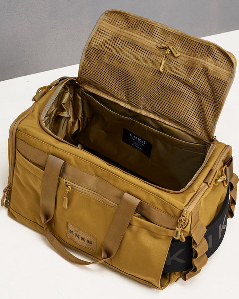 Birds eye view of empty desert CORE Duffel, showing internal pockets and laptop sleeve