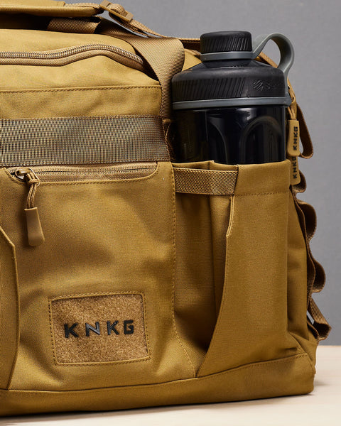 Shaker bottle inside desert CORE duffel bottle pocket
