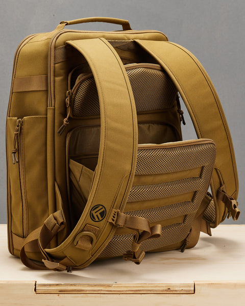 Back view of hidden concealed compartments of Small desert KNKG CONQUER Backpack