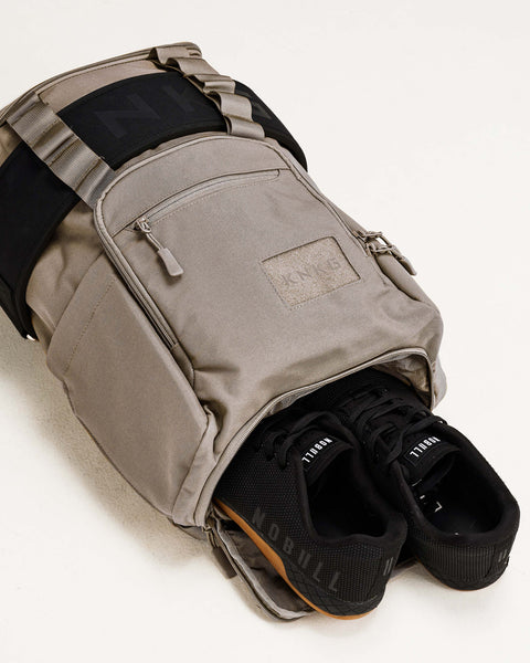 Sneakers inside beige neutral CORE Backpack shoe compartment