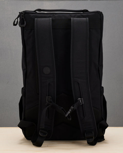 Back view of shoulder straps and chest strap on black CORE Backpack