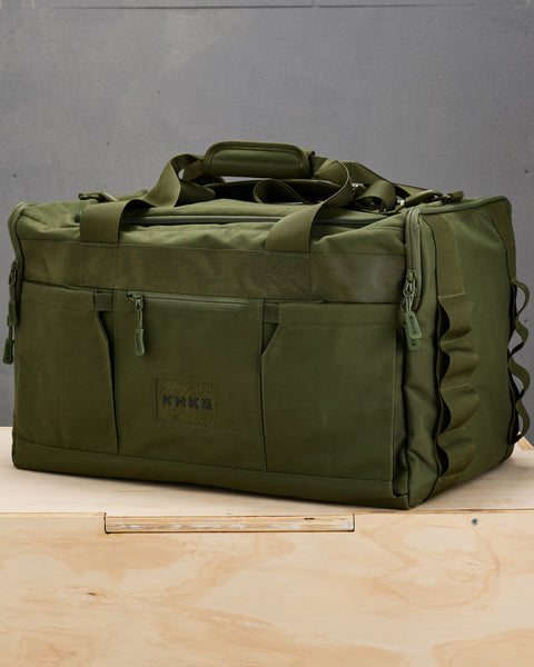 Side view of large green CORE Duffel