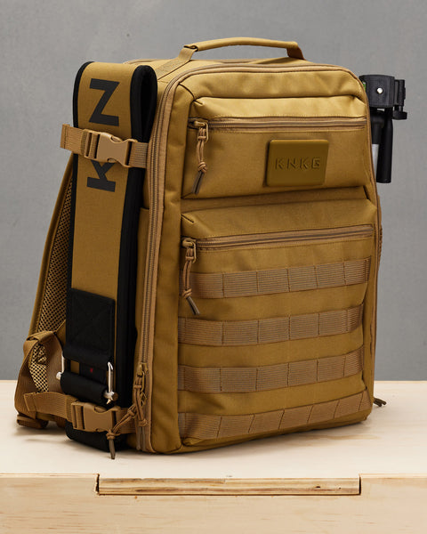 Weight lifting belt attached on side of Small desert KNKG CONQUER Backpack