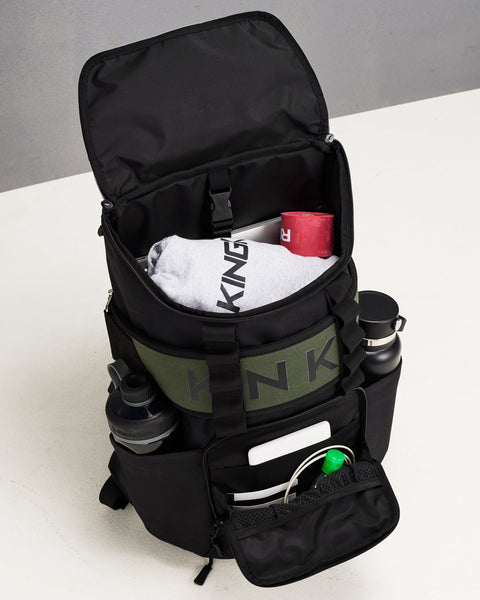 Internal of CORE Backpack packed with lifting belt, drink bottles and workout gear