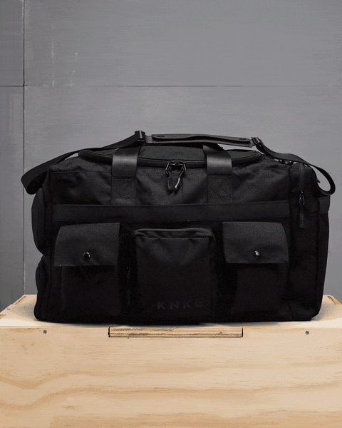 360 degree view of large black KNKG PLUS duffel