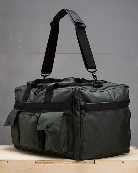 Side view of KNKG large charcoal PLUS Duffel