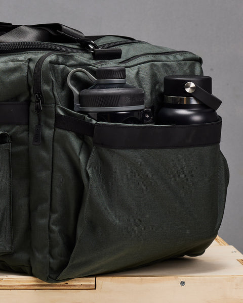 Side drink bottle pockets of KNKG large charcoal PLUS Duffel