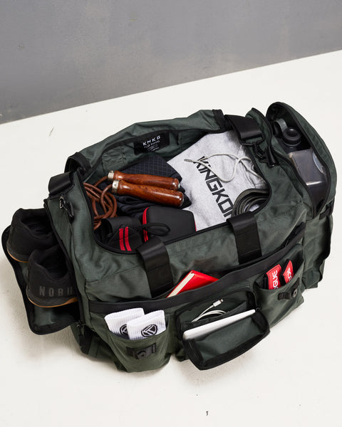 Birds eye view of KNKG large charcoal PLUS Duffel packed compartments and pockets