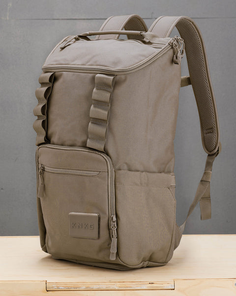 Side view of beige neutral CORE Backpack