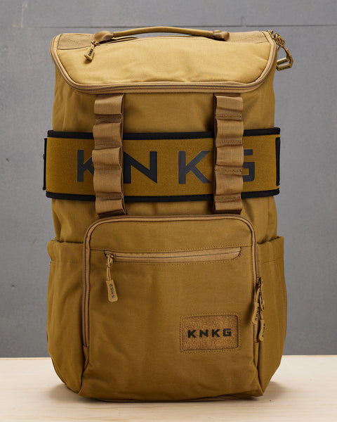 Front view of large desert CORE Backpack with matching weight lifting belt attached to bag