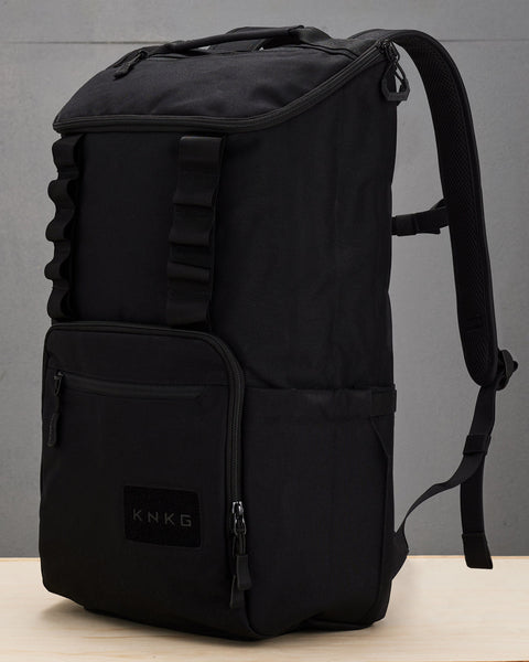 Side profile view of large black CORE Backpack