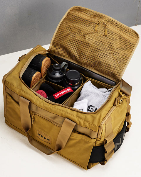Birds eye view of internal divider organization system inside large desert CORE Duffel