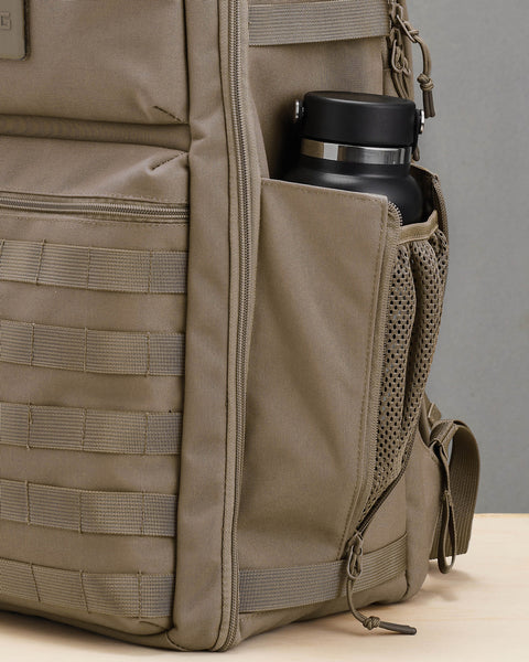 Drink bottle inside mesh pocket of beige neutral large KNKG CONQUER Backpack