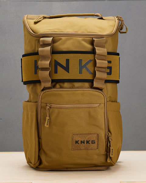 Front view of desert KNKG CORE Backpack with matching weight lifting belt attached
