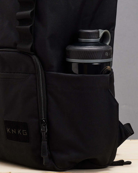 Shaker inside large black CORE Backpack side bottle pocket