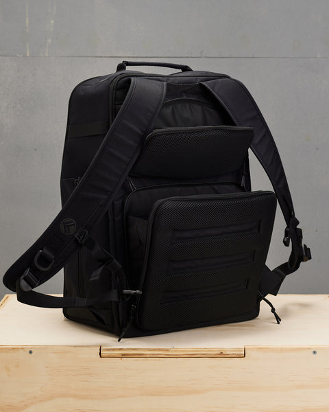 Back concealed compartments of large black CONQUER Backpack