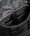 Laptop sleeve inside KNKG Mini CORE Backpack in Black