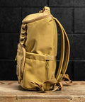 Side drink pocket view of KNKG CORE Mini Backpack in Tan Desert color
