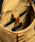Close up of internal laptop sleeve in KNKG CORE Mini Backpack in Tan Desert color