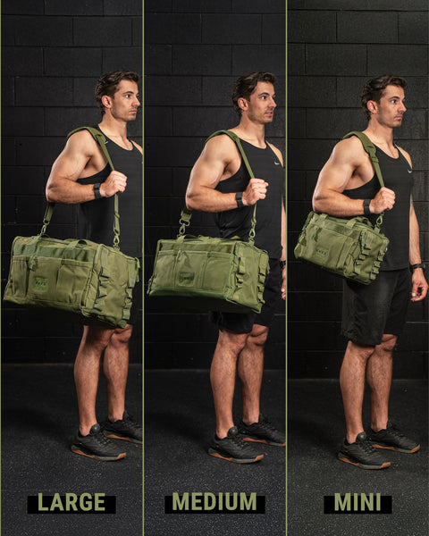 Man holding green bags labeled 'Large', 'Medium', and 'Mini' against a black brick wall.