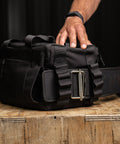 Lifting belt compartment on KNKG mini black CORE Duffel 
