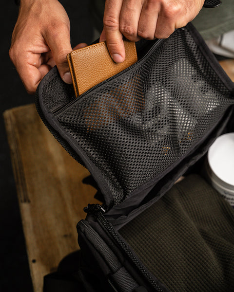Wallet in pocket of KNKG mini black CORE Duffel 