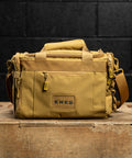Front view of KNKG desert tan color mini CORE duffel