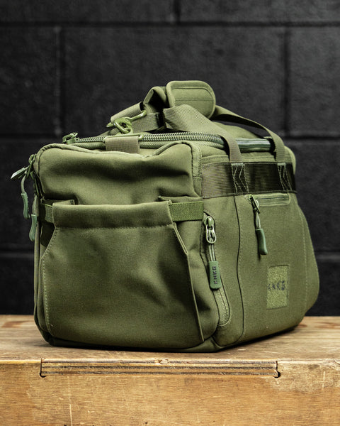 Side pocket of green KNKG mini duffel