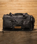 Front view of KNKG Waxed Canvas Duffel 