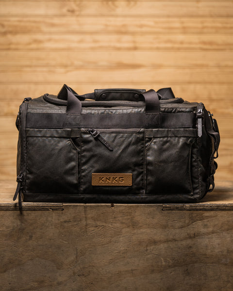 Front view of KNKG Waxed Canvas Duffel 
