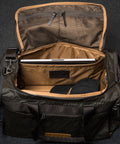 Laptop sleeve inside KNKG Waxed Canvas Duffel 