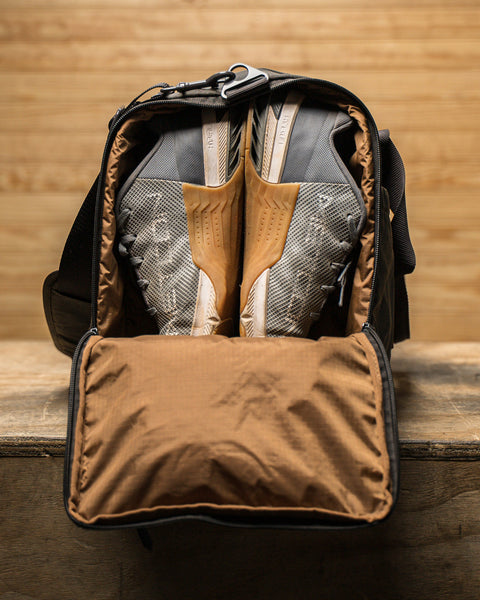 Shoe compartment on side of KNKG Waxed Canvas Duffel 