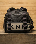 Close up of lifting belt sleeve on KNKG Waxed Canvas Duffel 