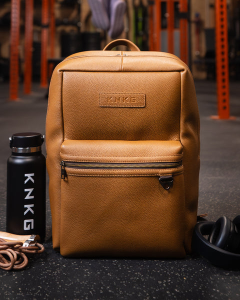 chestnut leather backpack zippers KNKG HERITAGE Leather Backpack 23L Tan
