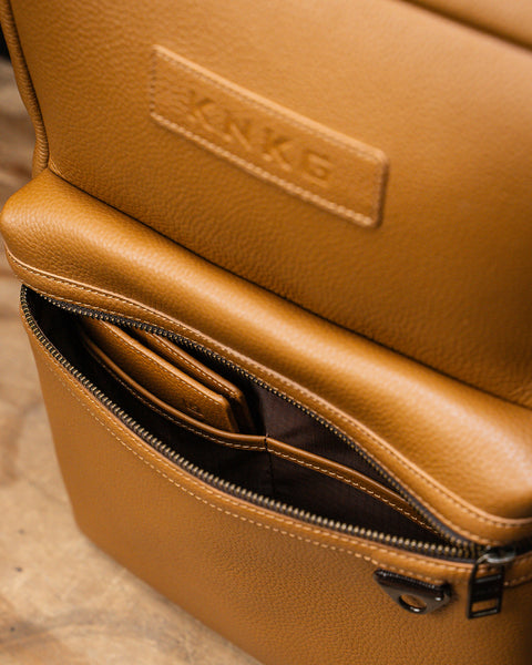 chestnut leather backpack zippers KNKG HERITAGE Leather Backpack 23L Tan
